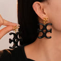 Pendientes Triple C